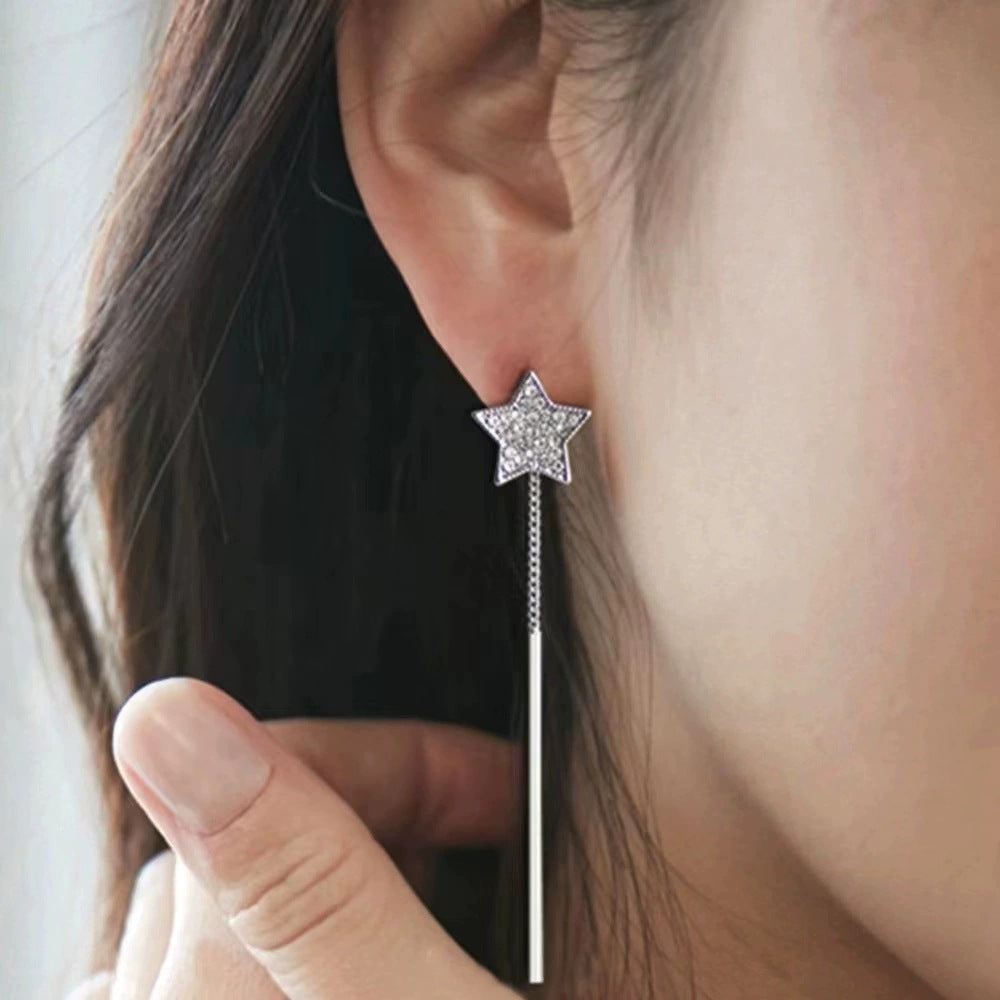 Pendientes colgantes de hojas huecas con borlas de moda