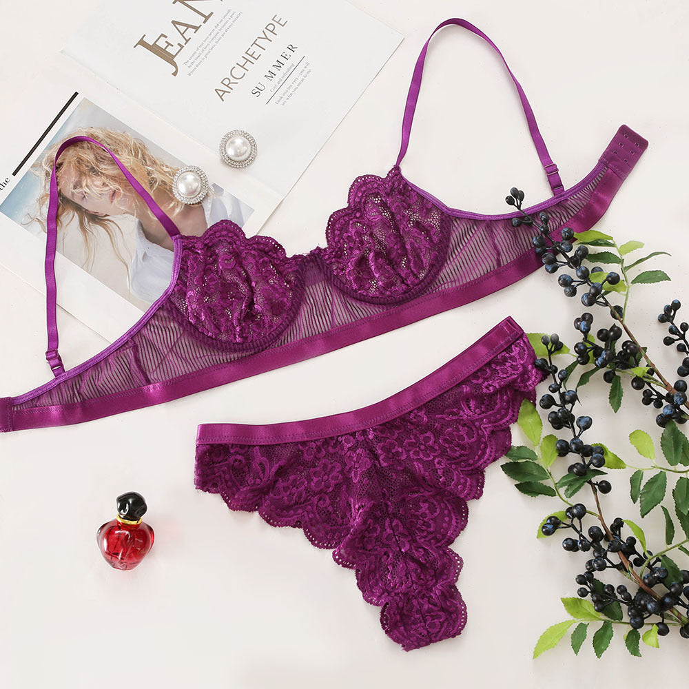 Traje femenino sexy de encaje con flores