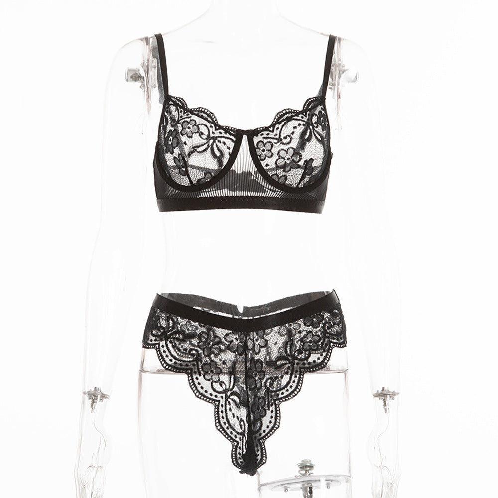 Traje femenino sexy de encaje con flores