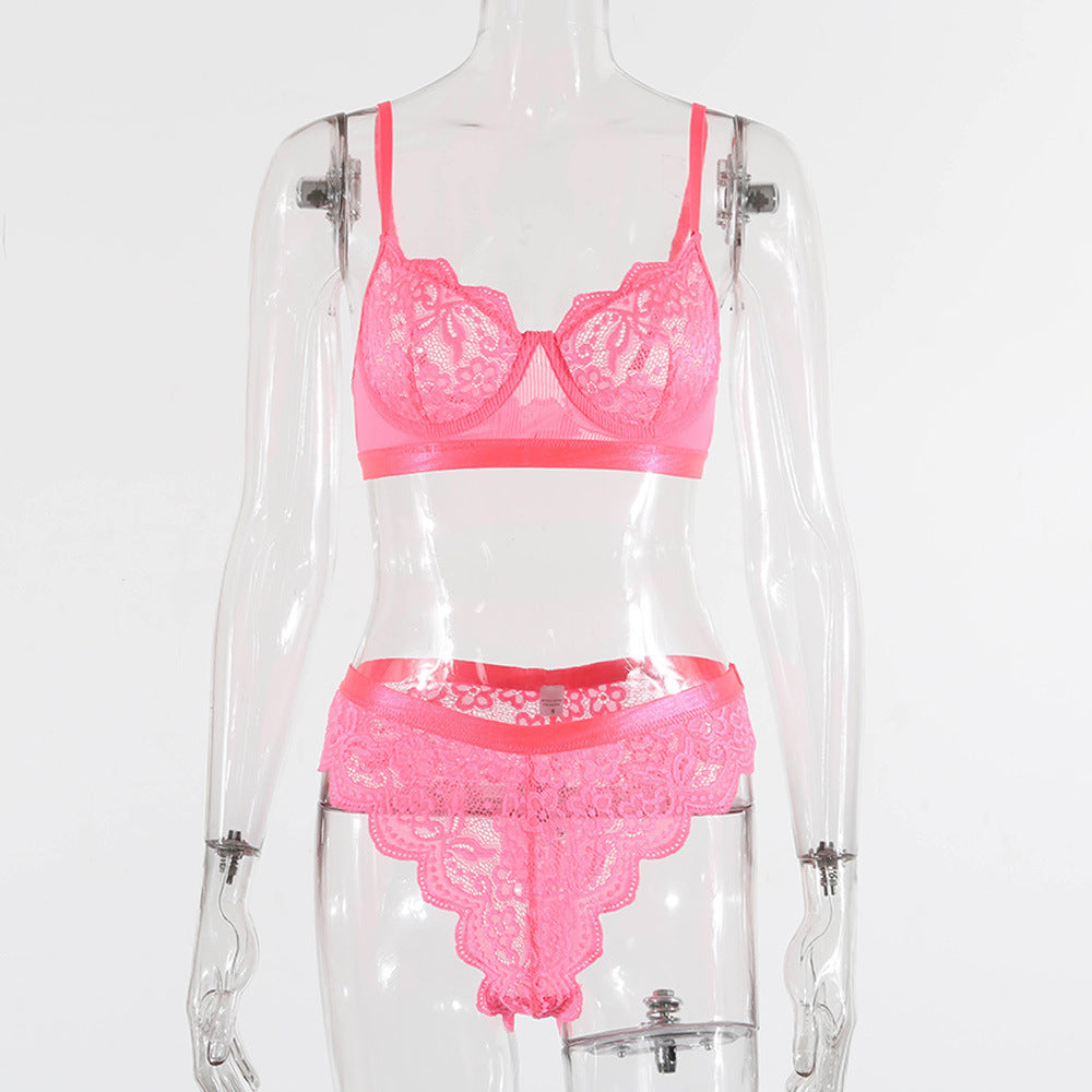 Traje femenino sexy de encaje con flores