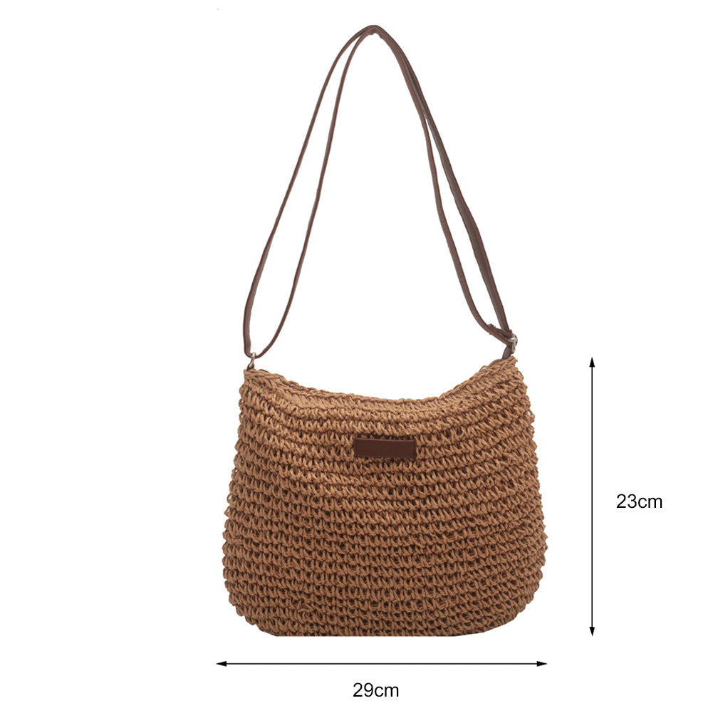 Bolso de mano de paja de diseño exclusivo para vacaciones.