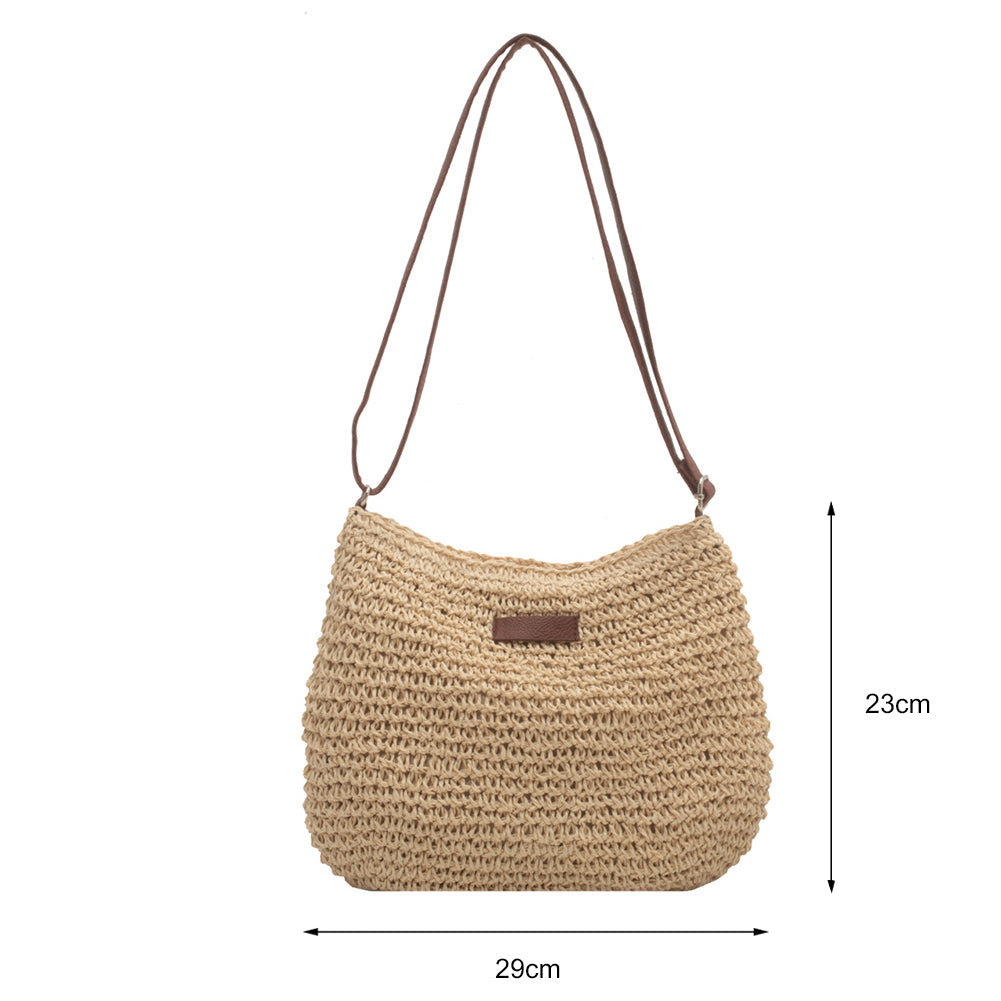 Bolso de mano de paja de diseño exclusivo para vacaciones.